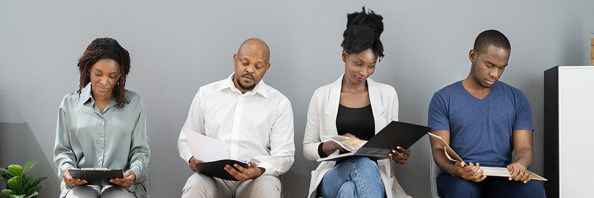 Sudanese Youth people looking at the document