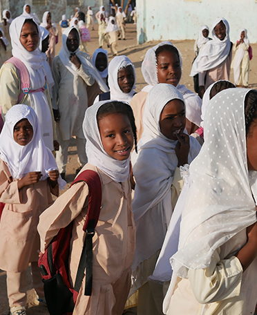 Scarfed young Sudanese students