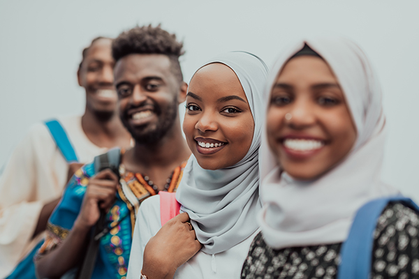 A group of Sudanese students posing towards camera